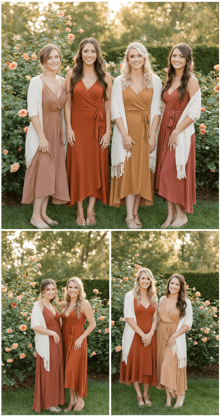 Full-length portrait of four bridesmaids in earthy-toned dresses—rust, cinnamon, terracotta, and bronze—in a manicured garden on a crisp October morning. Morning dew glistens on rose bushes behind them, as they wear asymmetrically draped ivory knit wraps and rose gold accessories that catch the soft sunlight. The natural poses highlight the movement of their dresses.