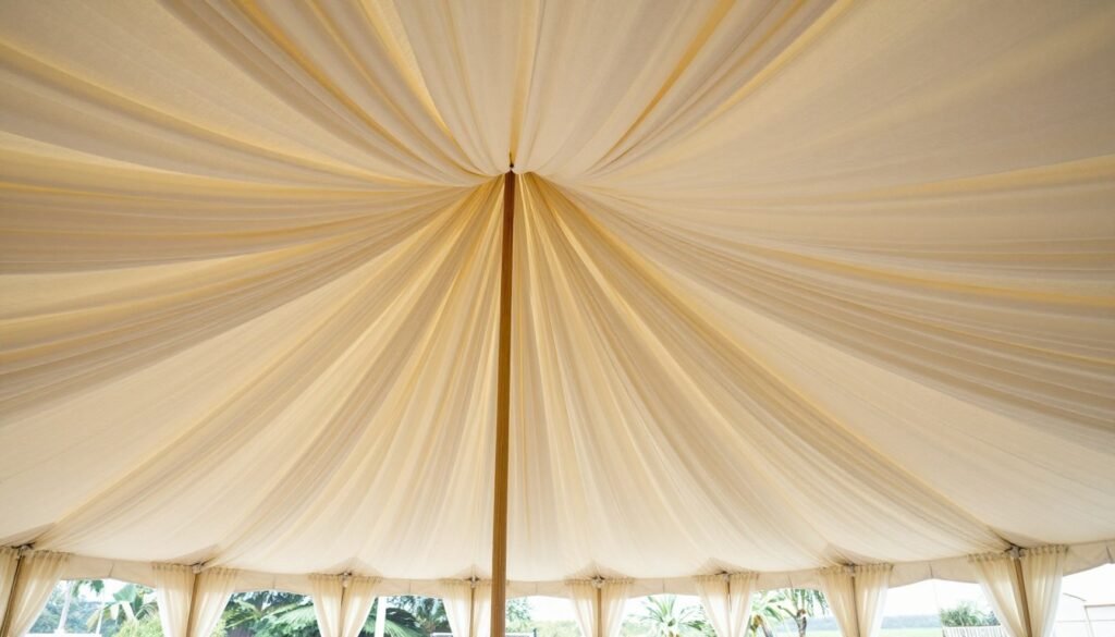Tent ceiling with fabric draping and swags